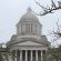 Governor signs budgets, millionaires tax